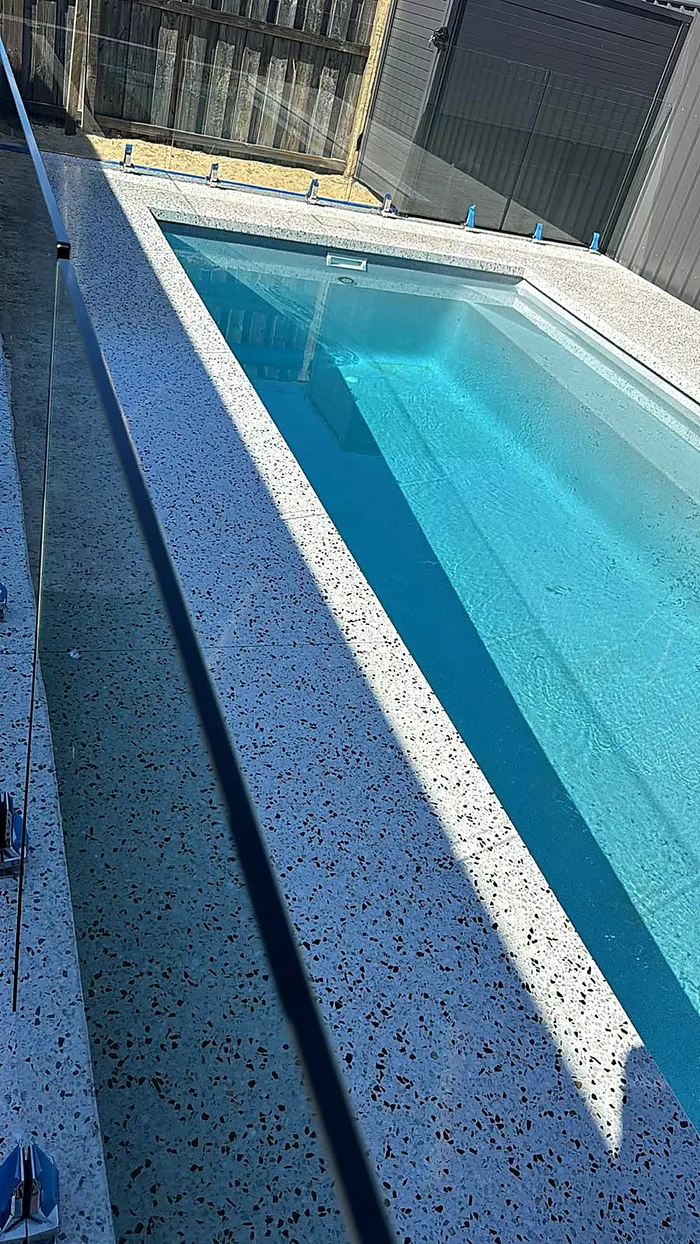 Exposed aggregate driveway — pea gravel finish